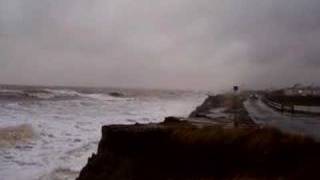 preview picture of video 'Tidal Surge Destroys Road Hits Car S.O.S.Save Skipsea and East Coast Now'