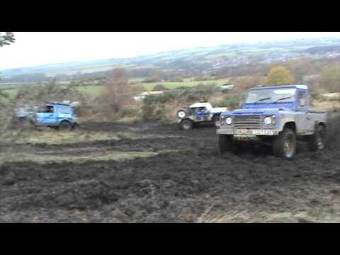 land rover defender muddy climb pea farm off road
