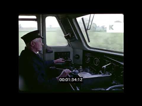 1960s UK, Train Driver in Cab, POV From Train, Countryside, 35mm