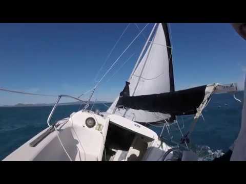 Macgregor 26x sailing Whitsunday Islands in strong gusty winds.