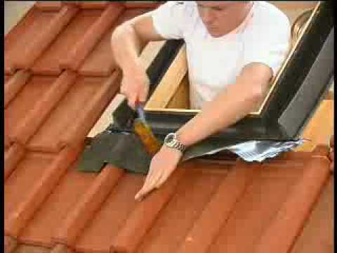 Skylight installation on tile roofing