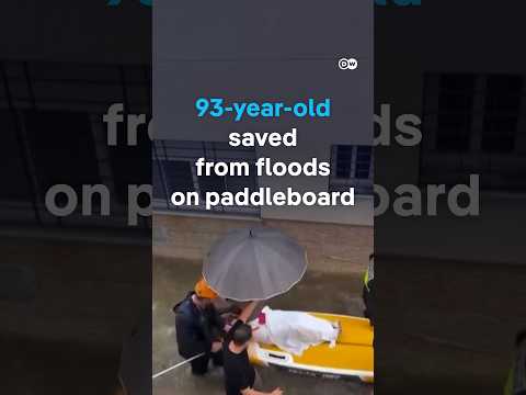 93-year-old saved from Spain floods on paddleboard | DW news