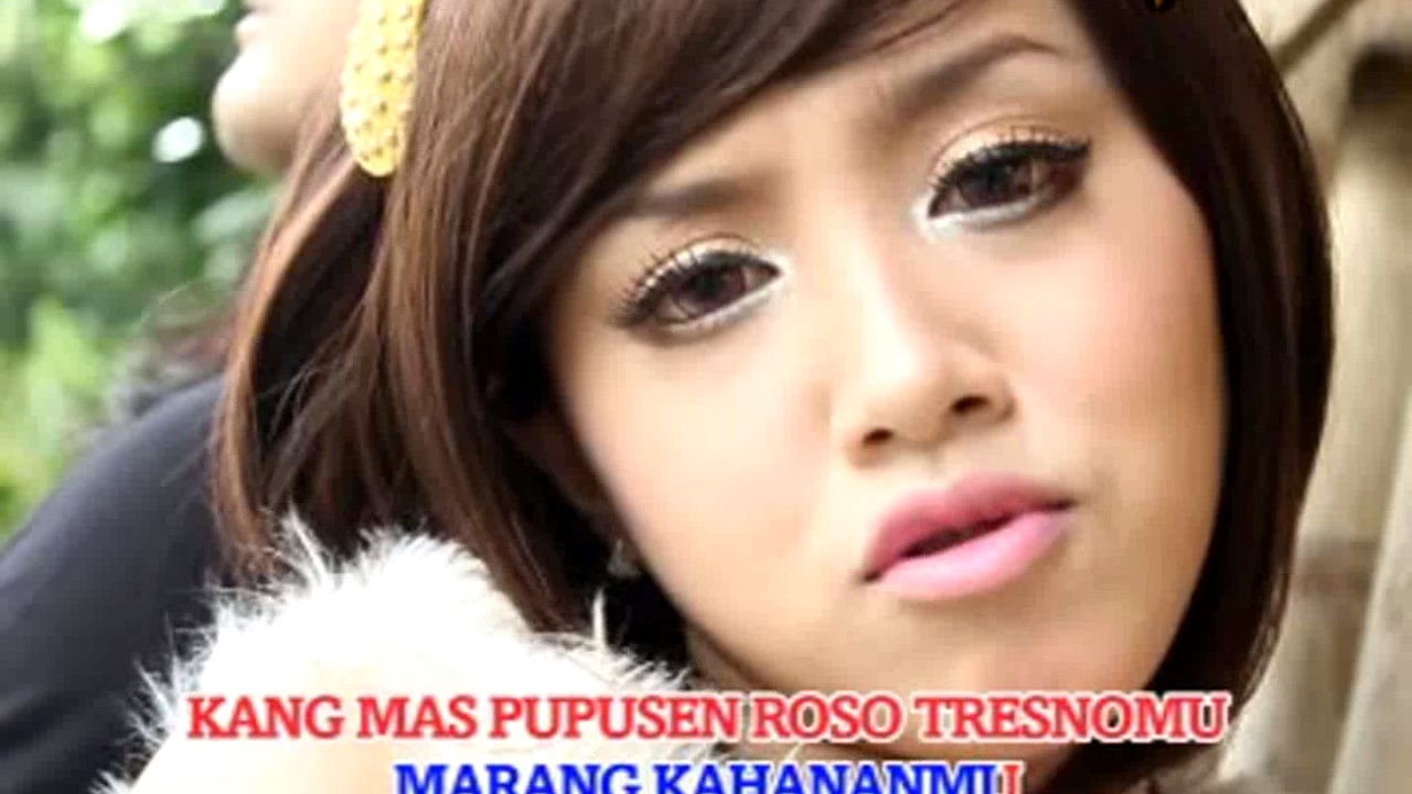 Erik Sukirgenk Feat. Sarah Brillian - Pupusing Nelongso | Dangdut (Official Music Video)