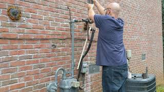 Tapping on to a gas meter.
