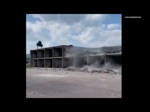 Domino-style demolition of old hotel