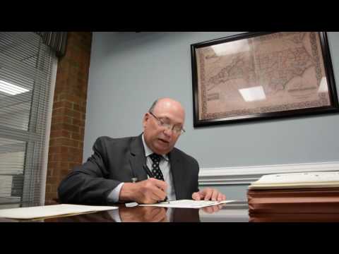 Richmond Community College President signing diplomas