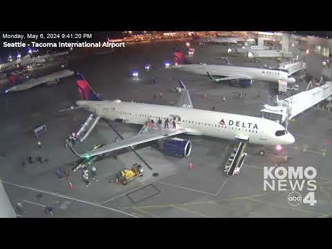 Video shows evacuation of Delta flight at Seattle airport after mechanical malfunction sparks fire