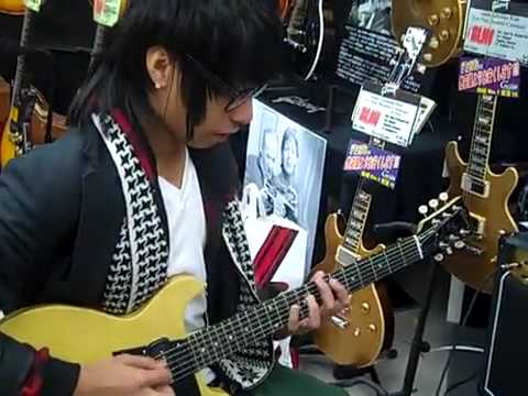Messing around on guitar (Tokyo, JP)