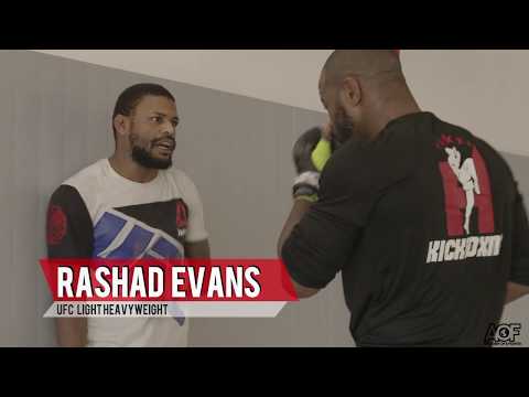 Rashad Evans coaches a frustrated Michael Johnson with his ground game