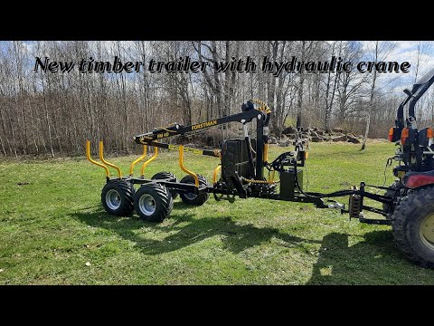 New timber trailer with hydraulic crane. Forstman FM40