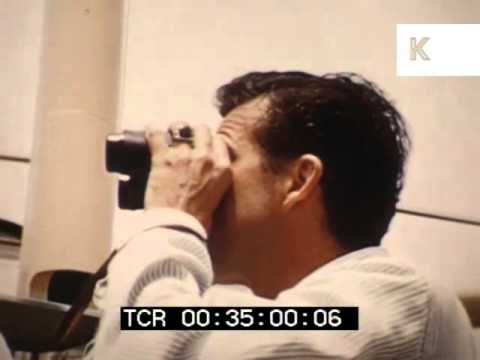 1950s Cruise, Man Looks Through Binoculars, Woman Takes Photograph, Archive Footage