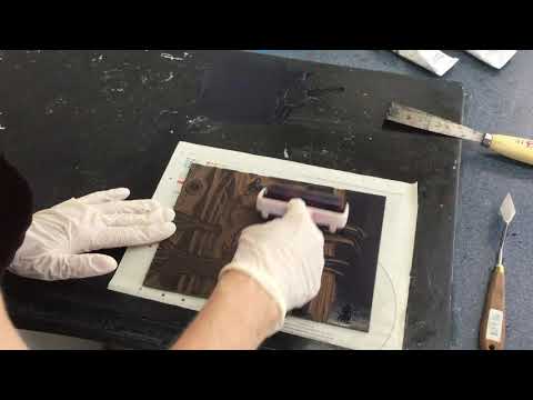 Grabado en linóleo a dos tintas.