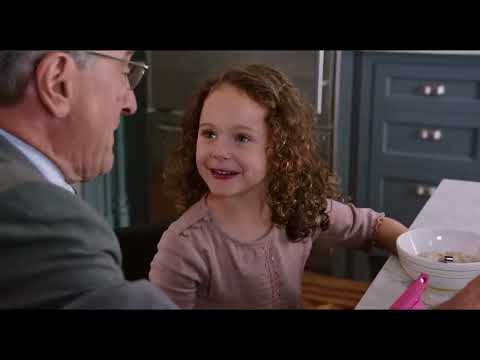 Trailer close-up: Ben watches Jules work; a soft piano figure underlines respect, not rescue