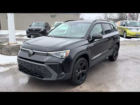 2026 Volkswagen Taos Comfortline Black Edition 4MOTION in Black for sale at Belleville Volkswagen in Belleville, ON