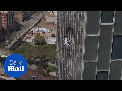 'Spiderman' free-climbs Europe's highest Skyscrapers in Barcelona