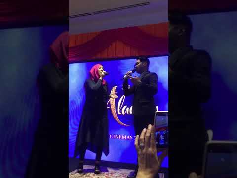 Shila Amzah and Hael Hussaini singing 'Dunia Baru' live