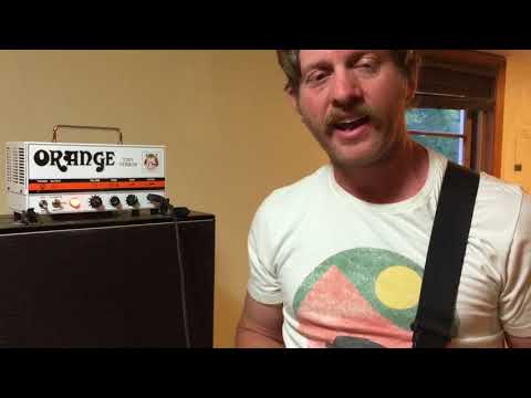 Orange tiny terror and vintage army pa with Jensen speaker.
