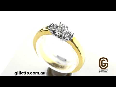 Three stone diamond engagement ring