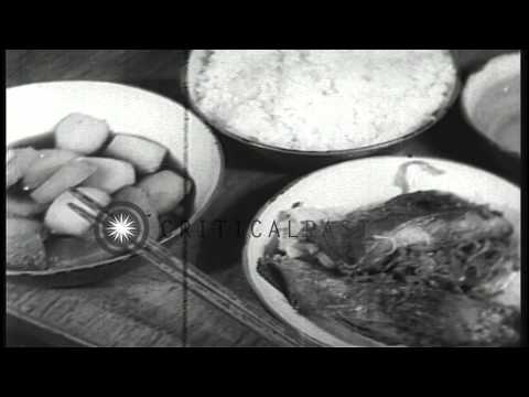 Sailors cook and eat aboard a Japanese submarine underway in the Pacific Ocean du...HD Stock Footage