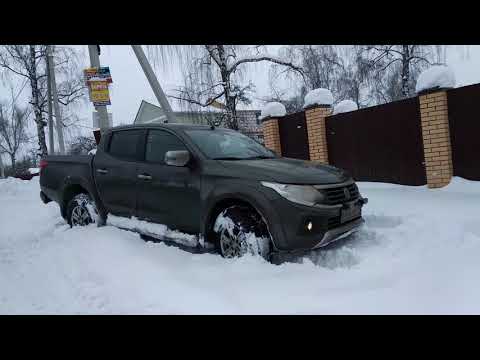 Fiat Fullback in snow with lame driver