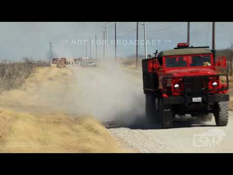 03-13-2022 Archer County, TX - Farmer watches as flames & smoke move closer to his cows. Over 500 ac