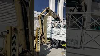 how to unload small excavator