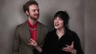 Billie and finneas being interviewed at the 94th Annual Oscars Nominees Luncheon in Los Angeles