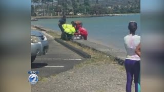 Woman dies after being pulled from waters near &#39;Spitting Caves&#39;