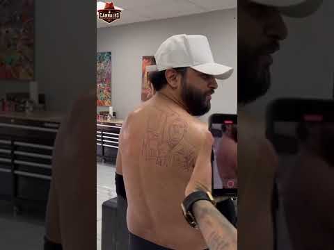 Tony Aguirre gets a tattoo of Luis R Conriquez
