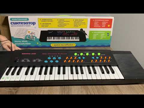 Распаковка детский электронный синтезатор Орган с микрофоном из Розетка