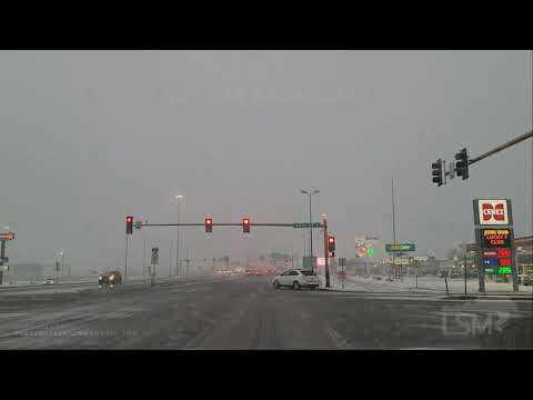 03-10-2021 Fargo, ND - Large snow flakes falling - Slush building up on Interstate 94