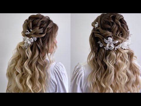 Half up half down hairstyle with flat iron curls.