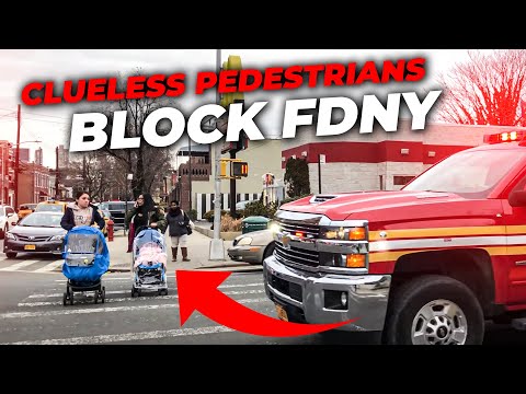 Two idiots don't yield to FDNY Emergency Vehicle & get scolded by police officers