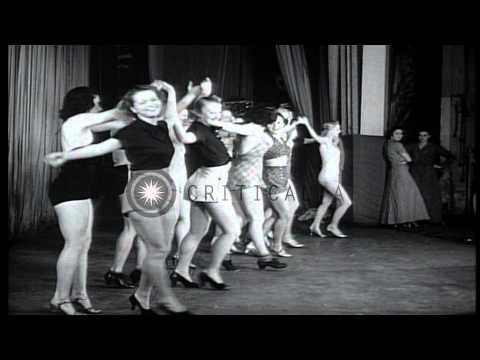 Women dancers of the Ziegfeld Follies Chorus line rehearse for musical production HD Stock Footage