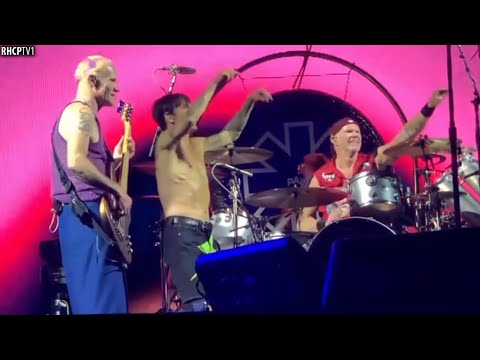 Flea, Anthony And Chad Looked And Pointed At John As If To Say, “Play Another Solo, Please!” (2023)