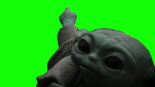 Grogu pointing green screen
