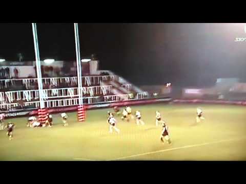 **BIZARRE RUGBY TRY OFF GOALPOST**
