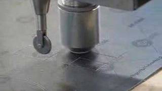 Reinforced graphite seal cutting