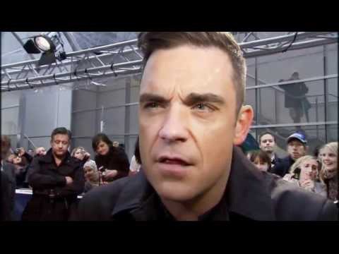 Robbie Williams makes 'sick' noises