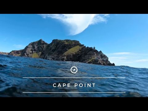 Getting dealt in the shorebreak and then paddling around Cape Point!