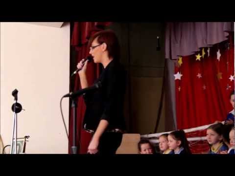 Sinead O'Brien sings for her young fans in St Louise School Ballyfermot