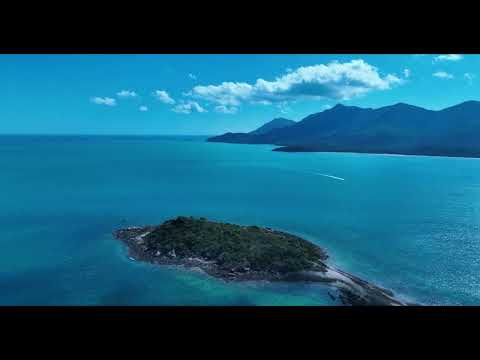 A quick visit to Hideaway Bay Whitsunday's from above.
