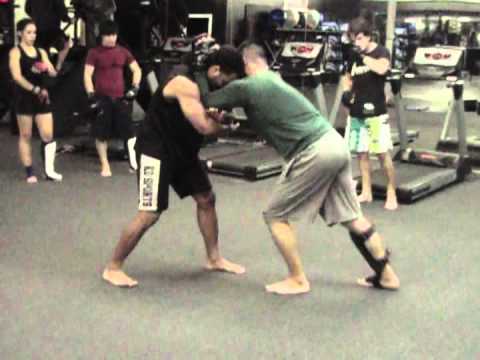 Brandon Farran demonstrating a defense and counter to the standard Thai clinch.