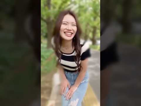 A beautiful woman enjoying kinky play in public.
