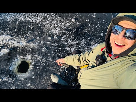 Ice fishing on clear ice with no snow in site