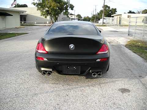 Flat black BMW M6 revving with newly installed Akrapovic Evolution exhaust