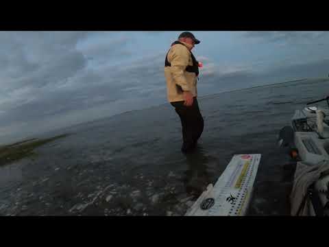 Releasing 45" Striped Bass.
