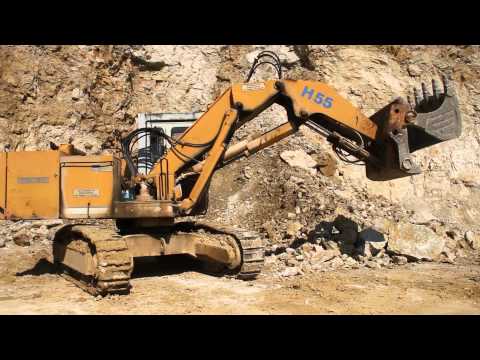 Demag H55 loading Iveco truck