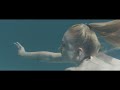 Beautiful Blonde Girl Swimming Underwater Pool