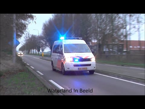 PRIO 1 OFFICIER VAN DIENST POLITIE MET SPOED NAAR WONINGBRAND